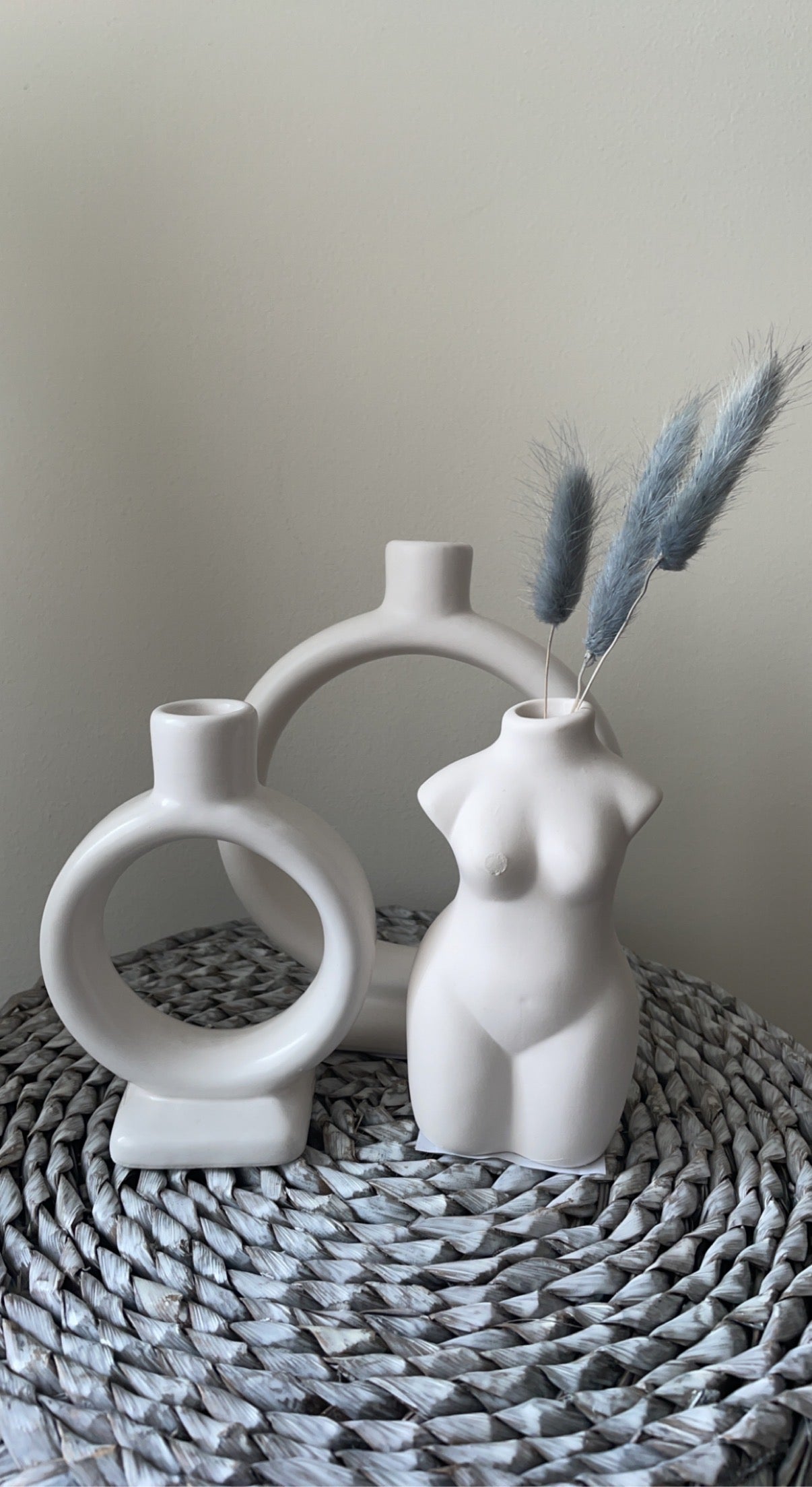 white ceramic body vase